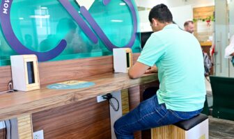 Passengers use pedal stations to charge smart devices at Costa Rican airport
