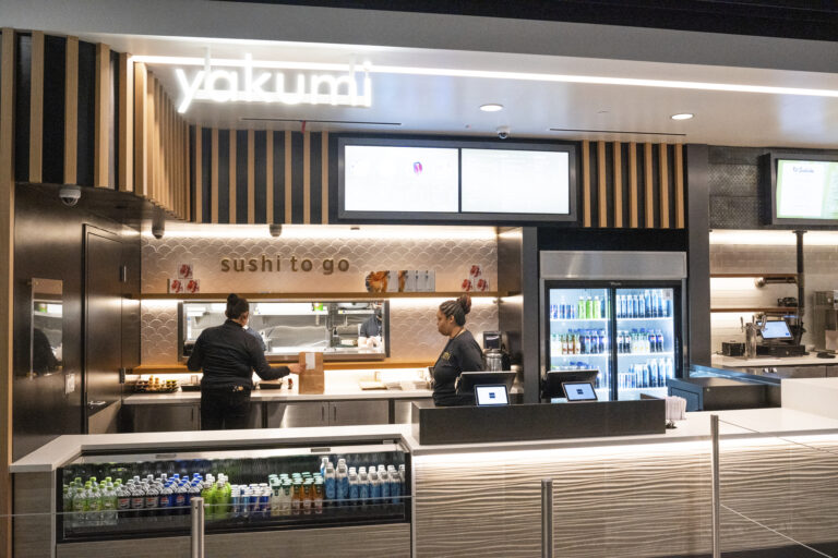 Four dining and retail concepts open at LAX Two staff members prepare sushi orders at the counter of the new Yakumi sushi restaurant at Los Angeles International Airport (LAX).