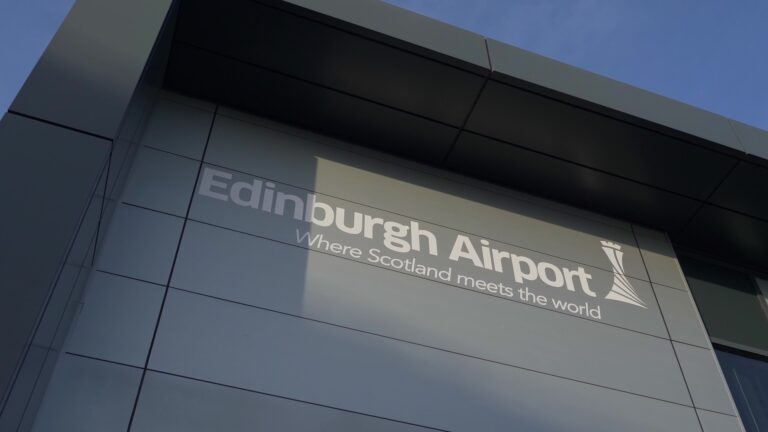 Vinci Airports to buy majority stake in Edinburgh Airport for £1.27bn The top corner of a building that says, "Edinburgh Airport, where Scotland meets the world".