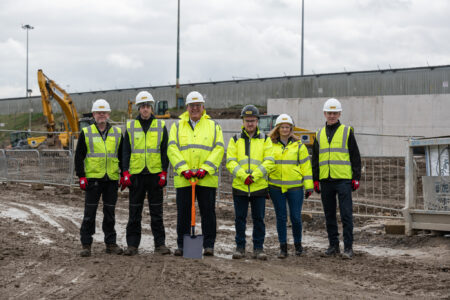 Leeds Bradford Airport CEO Vincent Hodder celebrates ground breaking of LBA:REGEN project with Farrans Construction and LBA apprentices.