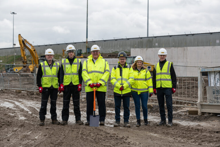 Leeds Bradford Airport CEO Vincent Hodder celebrates ground breaking of LBA:REGEN project with Farrans Construction and LBA apprentices.