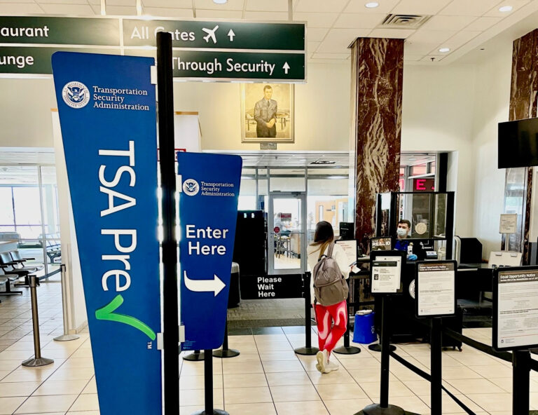 TSA expands PreCheck to eight new airlines A passenger walks up to a TSA checkpoint.