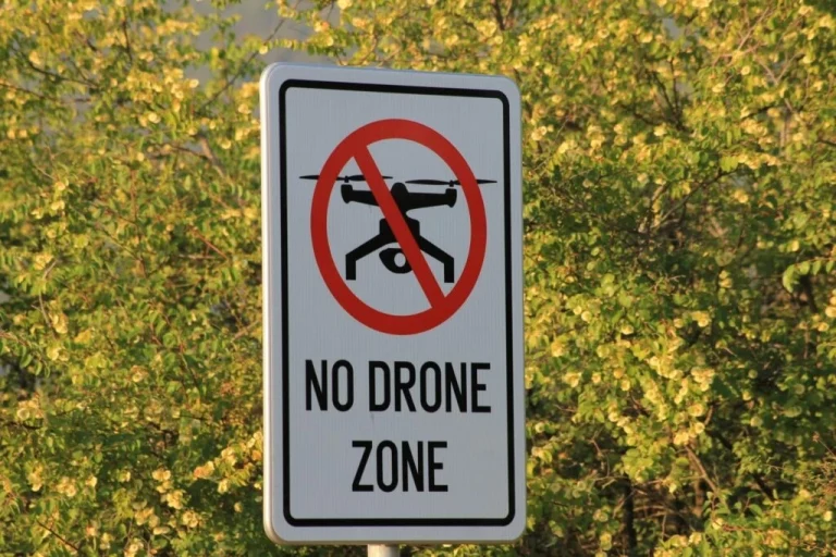 GAO calls for modifications to better protect airports from drones A road sign that says "No drone zone" with a graphic of a drone with a red line through it.
