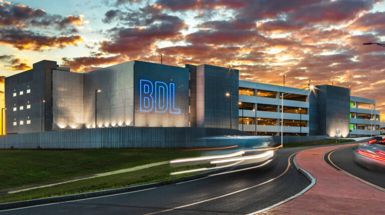 Bradley Airport announces changes to TSA security checkpoints An exterior shot of Bradley International Airport’s terminal at sunset.