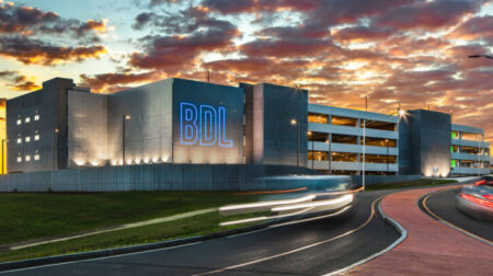 An exterior shot of Bradley International Airport’s terminal at sunset.