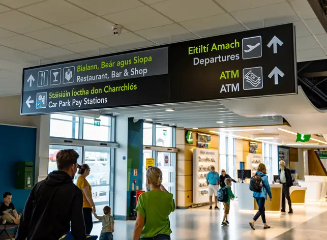 Passengers walk through the retail area of Ireland West Airport.