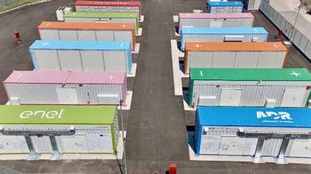 11 colorful metal structures sit in neat pairs.