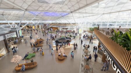 A overhead render of the inside of a busy airport terminal with natural light.