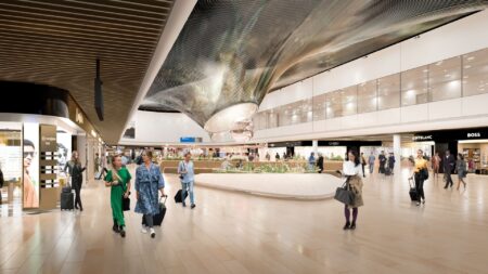 Frankfurt Airport unveils Terminal 3 shopping experience A render of Frankfurt Airport's new retail area shows passengers walking around a futuristic ceiling.
