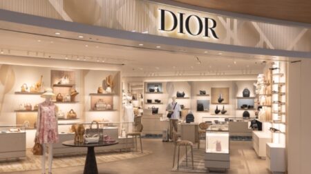 Dior and Louis Vuitton arrive at Milano Malpensa Airport Milano Malpensa Airport's Dior outlet is lit up by white lights.