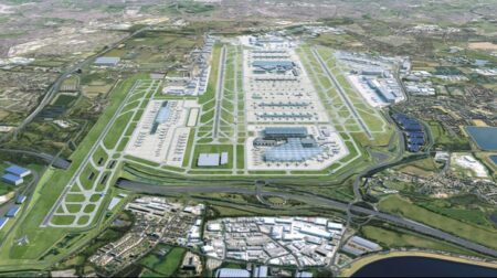 An aerial view of Heathrow Airport shows three runways.
