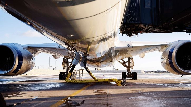Copenhagen Airport deploys Assaia tech to monitor APU emissions The underside of a parked aircraft on the tarmac