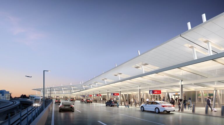Rendering of the exterior of the new T6 at JFK airport in New York City, with cars out the front, and a clear dusk sky above