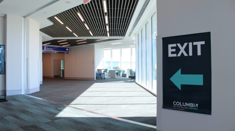 Columbia Metropolitan upgrades security checkpoint A quiet terminal at Columbia Metropolitan Airport with a large sign saying 'exit'