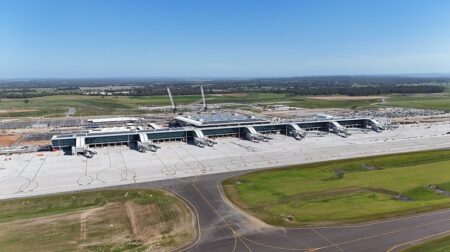Airplanes parked at a terminal at Western Sydney International Airport