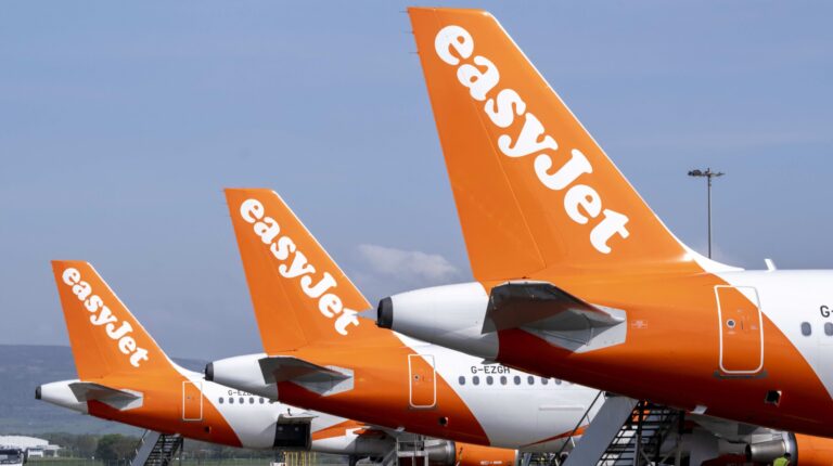 SITA collaborates with EasyJet to launch Agent App that enables mobile ground crew operations A line of EasyJet planes parked on the tarmac with their iconic orange livery