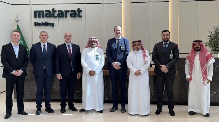 Mott MacDonald to lead consultation on airport development in Saudi Arabia Representatives from Mott MacDonald and Matarat Holdings pose in front of a a desk and wall that says Matarat Holdings