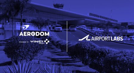 Aerodom and AirportLabs logos on a dark blue background with an airport building in silhouette behind this.
