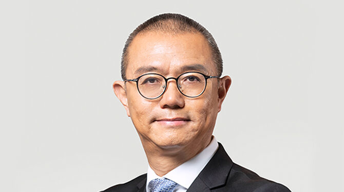 Headshot of Steven Yiu, executive director of airport operations, Airport Authority Hong Kong, against a white background.
