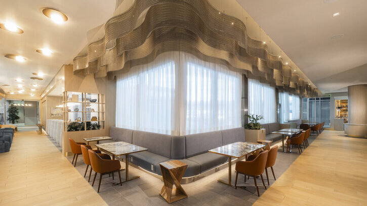 The interior of the Plaza Premium Group lounges at Dallas Fort Worth with elegant dining and bar offerings.