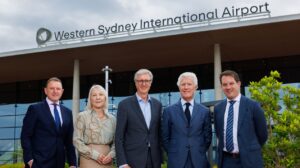 JCDecaux executives alongside WSI’s CEO and CCO stand in front of Western Sydney International Airport.