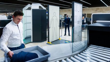 A Rohde & Schwarz passenger scanner in an airport.
