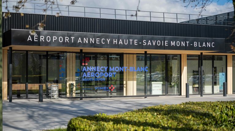 New terminal inaugurated at Annecy Haute-Savoie Mont-Blanc The exterior of the new terminal at Annecy Haute-Savoie Mont-Blanc airport, with a grass verge to the front and the airport name above the doors.