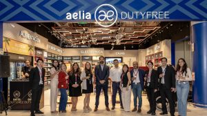 Representatives of Lagardère Travel Retail and Lima's Jorge Chávez Airport stand in front of the new opens last-minute duty free store. Company logos run across the top of the image.