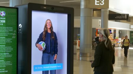 SFO’s digital twins greet passengers ahead of USA’s World Cup clash.