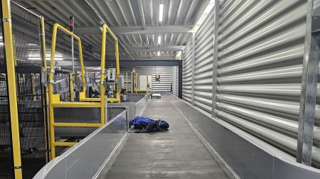 An item of luggage on a conveyor belt at Maastricht Aachen Airport.