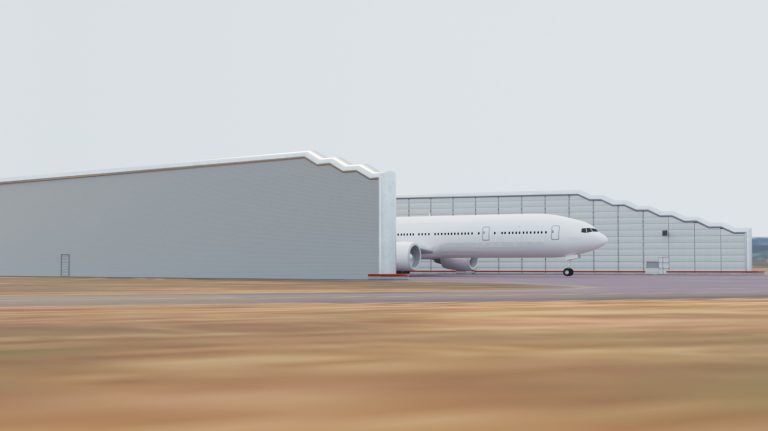 Work starts on quieter aircraft engine testing facility at Brussels Airport Representation of hat the new engine testing facility at Brussels Airport will look like. It has large high white walls and a white aircraft is partly visible.