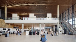 ArtiInterior of Western Sydney International (Nancy-Bird Walton) Airport with a range of passengers using the facilities.